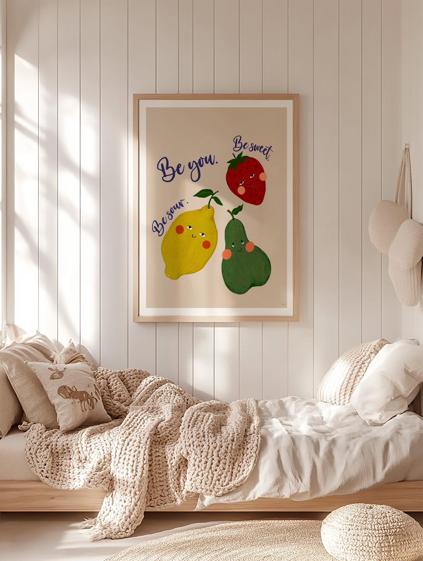 Fruit poster hanging on a nursery/kitchen wall, featuring colorful fruits with eyes and the motivational message “Be sweet, be sour. Be you.”