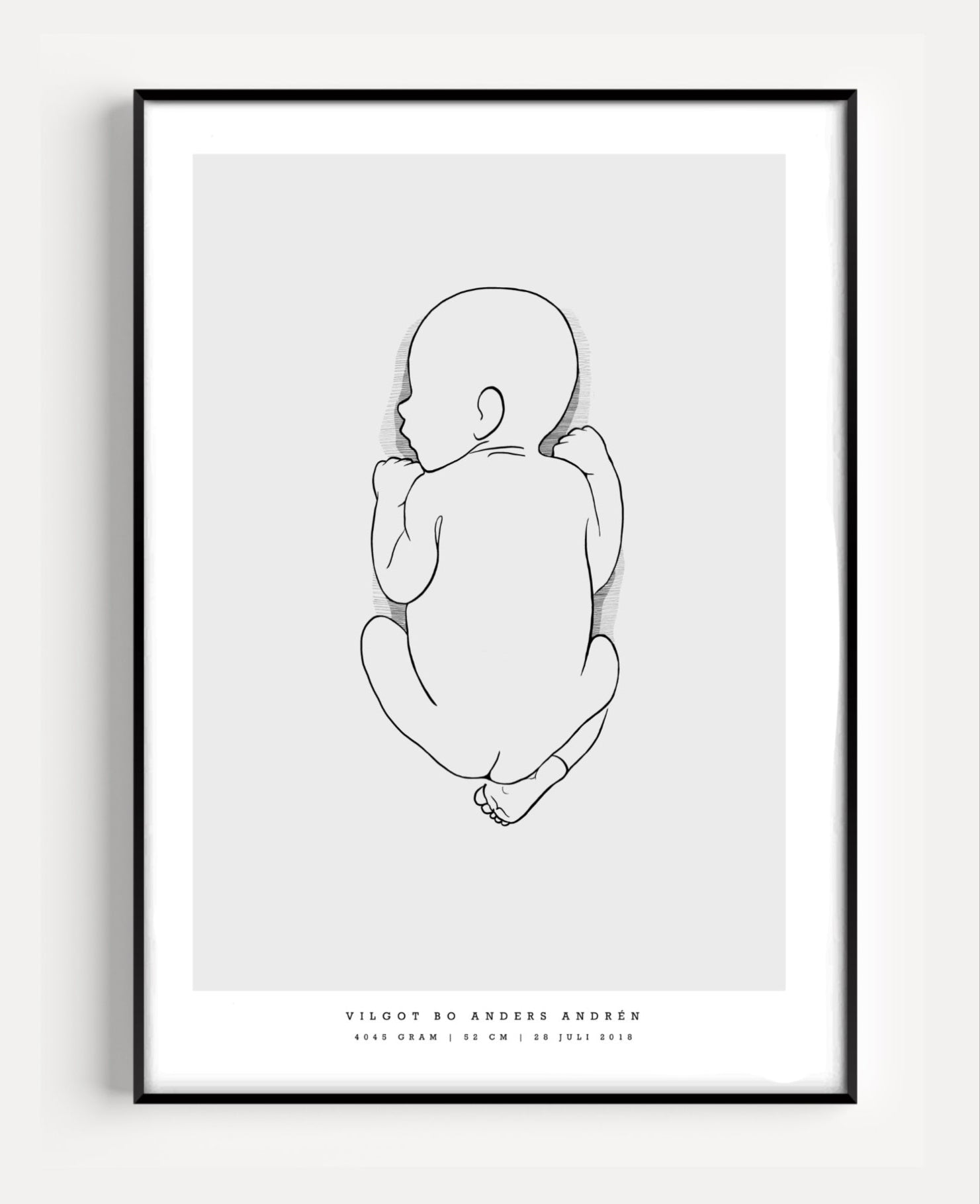 Illustration of a newborn baby lying on the stomach, featured on a birth poster