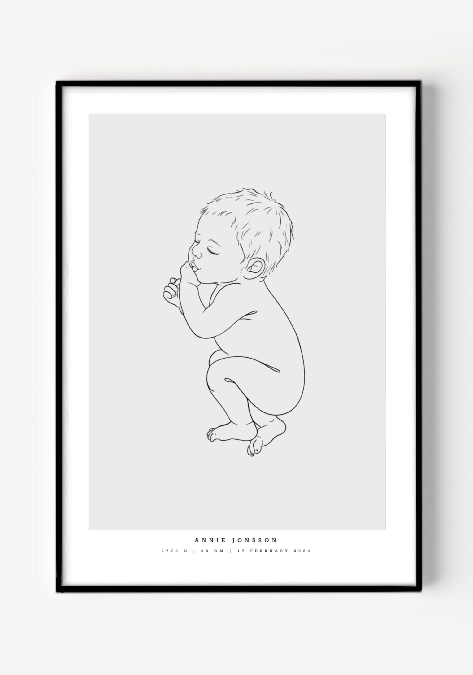 Illustration of a newborn baby lying on the side, featured on a birth poster