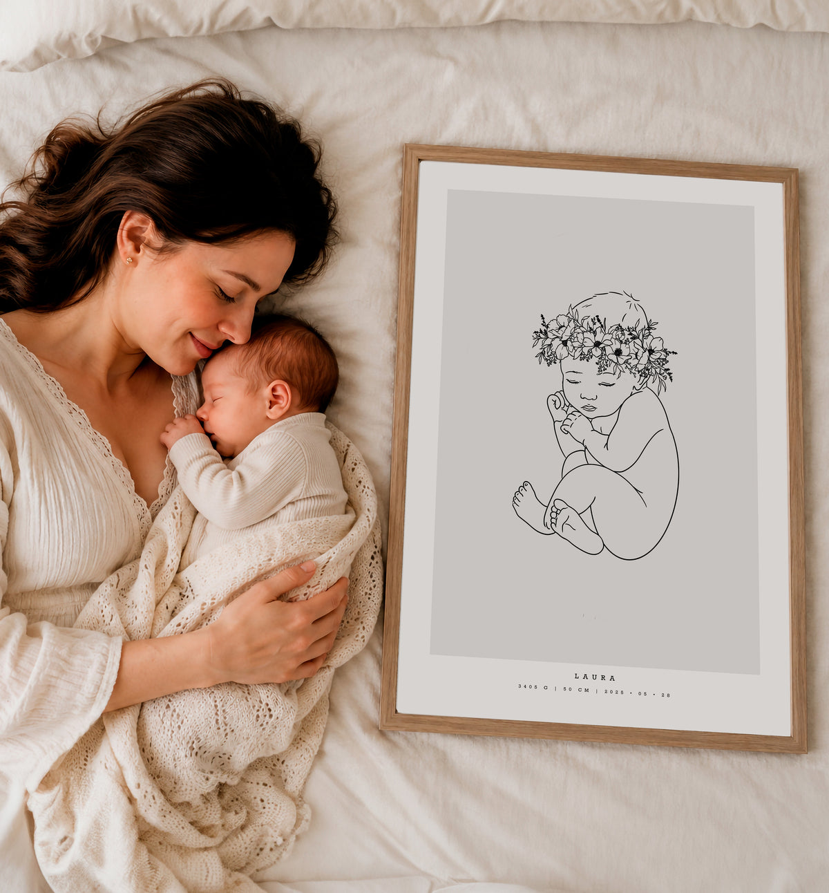 mother and her baby next to birth poster with flower wreth